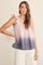woman wearing a pink and navy ombre gingham top with ruffle straps and loose fit