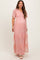 woman wearing a pink floral embroidered maternity maxi dress with flutter sleeves and a visible baby bump