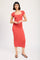woman wearing a coral ribbed knit midi dress with short sleeves and a square neckline, styled with flip-flops