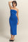 woman wearing a strapless royal blue midi dress with a fitted silhouette and a textured finish