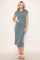 woman wearing a gray cap sleeve midi dress and white sandals