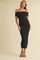 woman wearing a black ribbed off-the-shoulder midi dress with spaghetti straps and a fitted silhouette