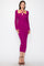 woman wearing a fuchsia long sleeve midi dress with a keyhole detail and a figure-hugging fit