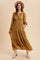 woman wearing a mustard yellow tiered maxi dress with long sleeves and a smocked waist, accessorized with a wide-brim hat