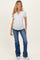 woman wearing a gray short sleeve maternity top and blue flared jeans, showing a visible baby bump