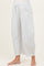 woman wearing light grey wide-leg maternity pants with pockets and an elastic waistband