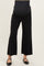 woman wearing black wide-leg maternity jeans with a high waist and stretchy panel for comfort