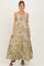 woman wearing a floral print maternity maxi dress with a knotted front detail and a visible baby bump