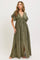 woman wearing an olive green maxi dress with a deep V-neck, ruffled sleeves, and button details.