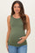 woman wearing an olive green maternity tank top and holding her baby bump