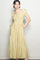 woman wearing a light yellow floral print maxi dress with puff sleeves and pockets