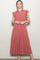 woman wearing a dusty rose tiered maxi dress with a collared neckline and ruffle sleeve details