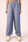 woman wearing light blue wide leg cargo pants with drawstring waist and pockets