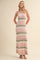 woman wearing a strapless ribbed maxi dress with stripes in pink and green