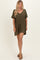 woman wearing an olive green short sleeve casual dress with a v-neck and loose fit