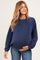 woman wearing a navy blue maternity sweatshirt with a relaxed fit and visible baby bump