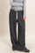 woman wearing gray marled wide-leg lounge pants with an elastic waistband and drawstring detail