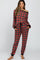 woman wearing a red and black plaid maternity pajama set with an off-the-shoulder top and pants