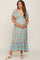 pregnant woman wearing a light blue floral maternity maxi dress with short sleeves and v-neckline