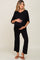pregnant woman wearing black maternity lounge set with short sleeve v-neck top and drawstring pants