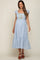woman wearing light blue maternity midi dress with floral embroidery and ruffle sleeves