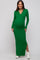 woman wearing a green ribbed maternity dress with a v-neck and side slit, highlighting her baby bump