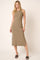 woman wearing a form-fitting olive green midi dress with side slits and high neckline