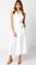 woman wearing a white sleeveless midi dress with a collared neckline and pockets