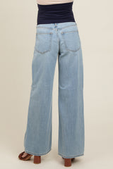 maternity wear light blue wide leg jeans with a stretchy waistband, model shown from the back