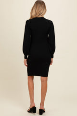 maternity wear black ribbed long sleeve dress with a fitted silhouette, shown from the back