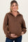 woman wearing a brown maternity pullover with a collar and relaxed fit, holding her baby bump