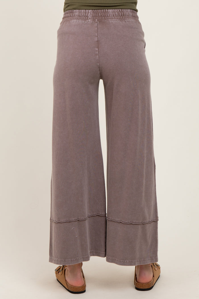 maternity wear lavender wide leg pants with a relaxed fit and elastic waistband, model shown from the back
