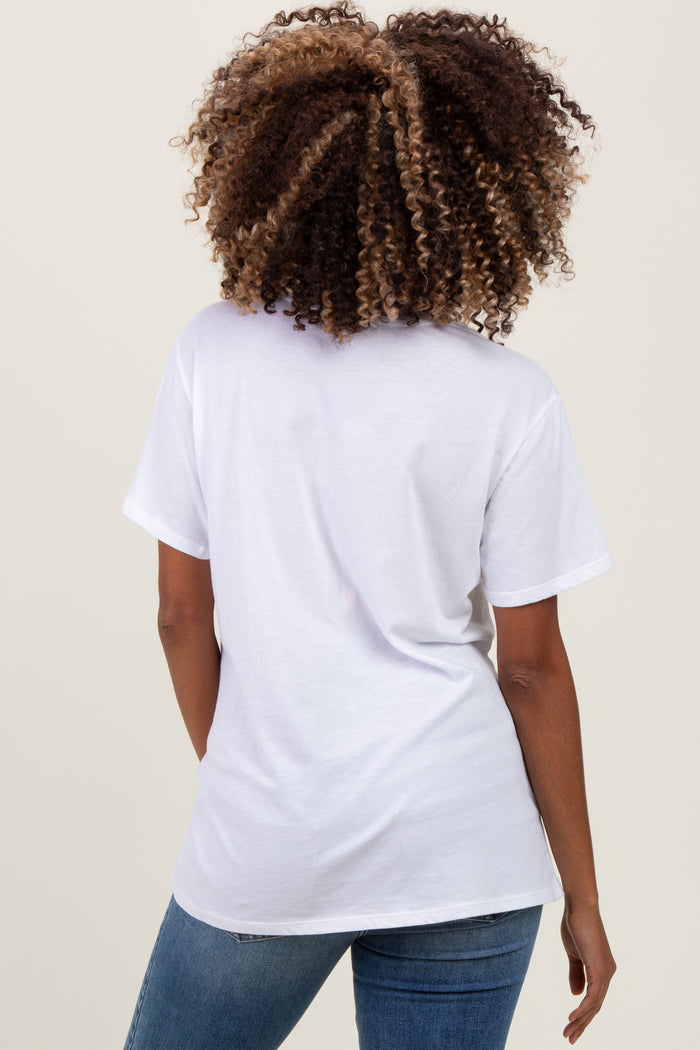 woman wearing a white maternity t-shirt and blue jeans, seen from the back