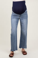 maternity wear light blue distressed wide-leg jeans with a stretchy navy maternity waistband