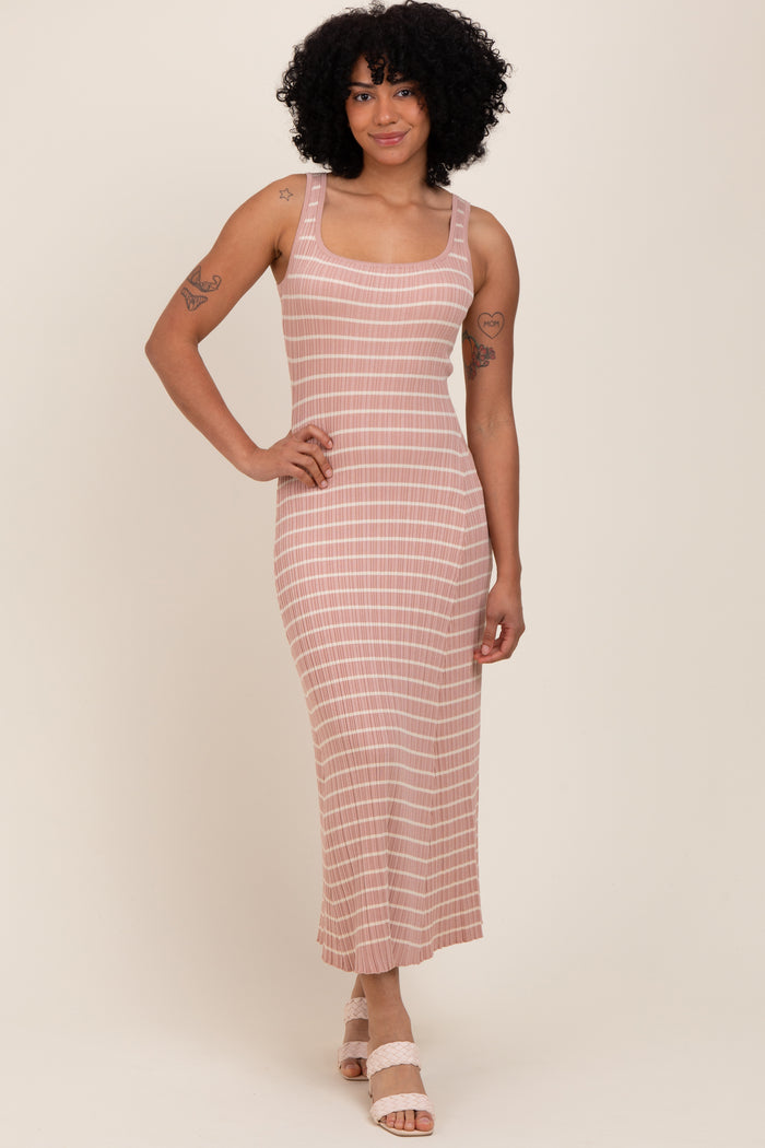 woman wearing a mauve striped sleeveless midi dress with a fitted silhouette and standing on a neutral background