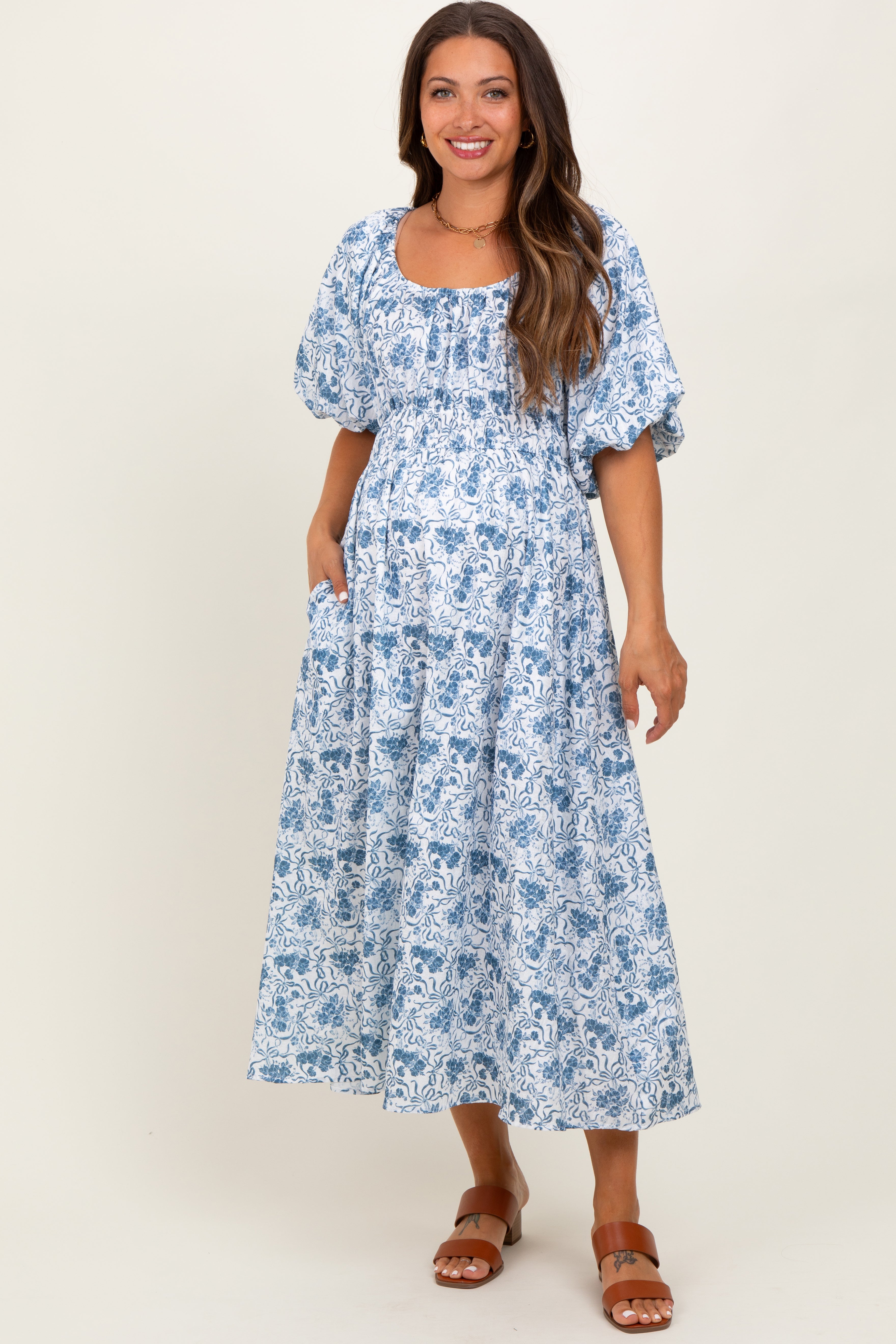 blue floral fitted maternity dress Hope & Ivy Maternity flutter sleeve maxi wrap dress with tie waist in blue floral print