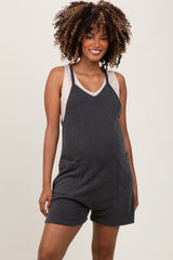 Black Solid Ribbed V-Neck Sleeveless Front Pocket Maternity Romper