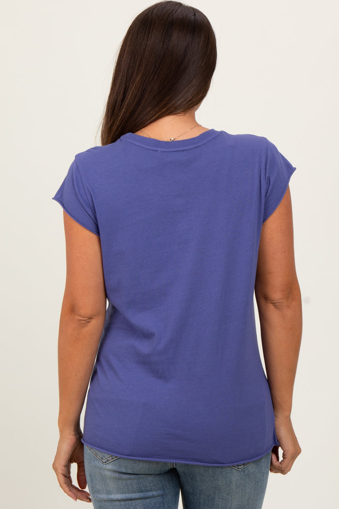 woman wearing a purple cap sleeve maternity top, showing the back view