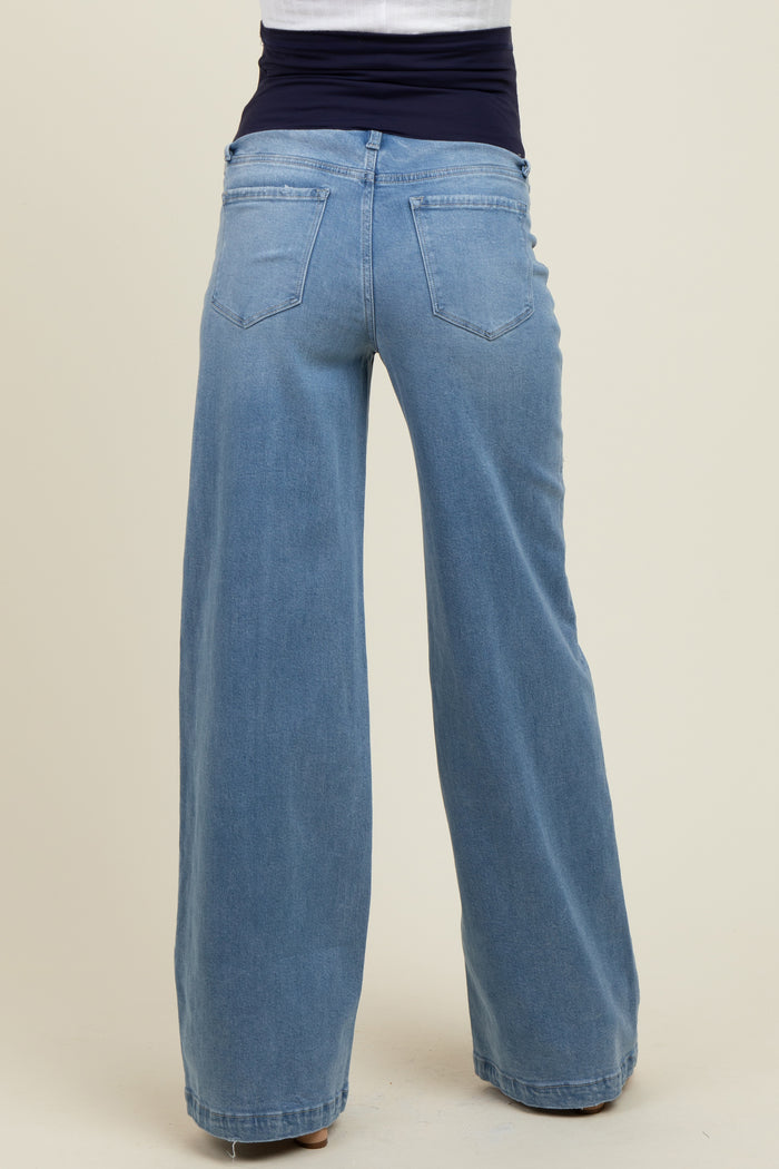 maternity wear light blue wide-leg jeans with a high waistband, worn by a model facing away from the camera