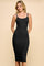 woman wearing a black ribbed midi dress with spaghetti straps and a fitted silhouette