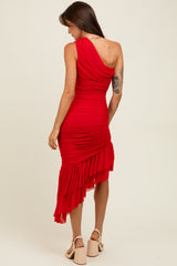 woman wearing a red one-shoulder ruched dress with asymmetrical ruffle hem and a fitted silhouette