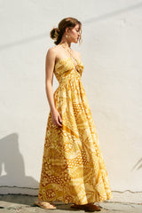 Yellow Printed Cutout Halter Maxi Dress