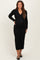 woman wearing a black long sleeve maternity cardigan dress with buttons and a visible baby bump