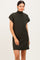 woman wearing a dark green ribbed short sleeve dress with a mock neck and a chest pocket