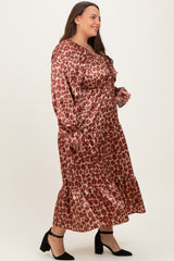 woman wearing a brown leopard print long sleeve plus size dress with ruffle hem and black high heels