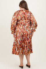 woman wearing a colorful floral maternity plus dress with puff sleeves and ruffle hem, seen from the back