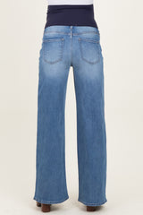 maternity wear light blue wide leg jeans with a multi-panel belly band, view from the back