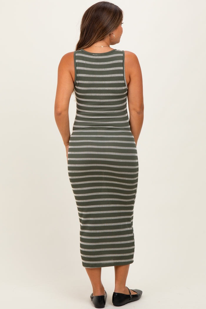 woman wearing a green and white striped maternity midi dress, shown from the back
