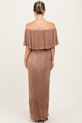woman wearing a dusty rose off-shoulder maternity maxi dress with a pleated design, viewed from the back
