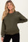 woman wearing an olive green maternity sweatshirt with a round neckline and ribbed hem